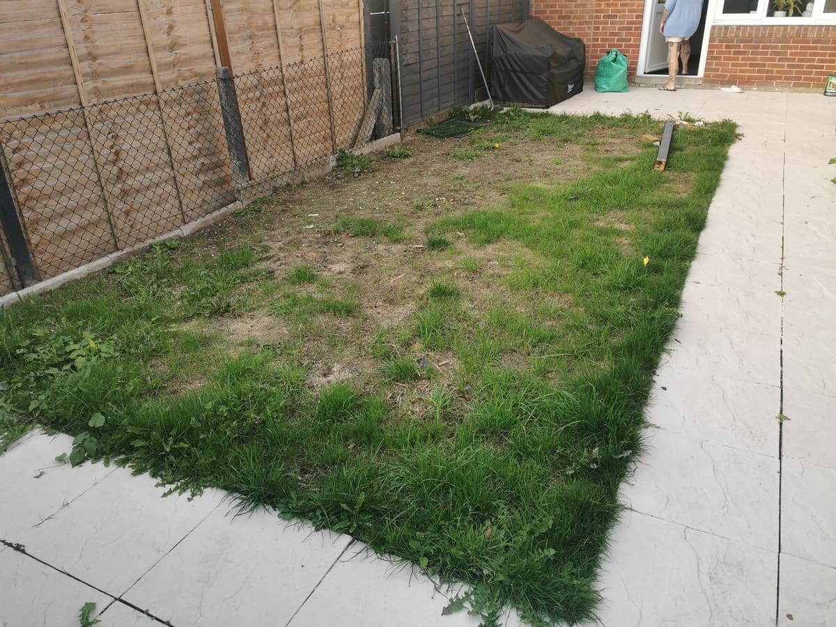 Before: Worn lawn to artificial grass