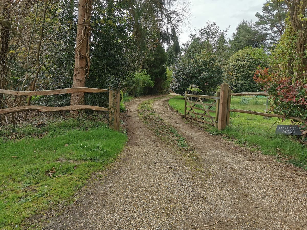 Before: Muddy track to a gravel drive