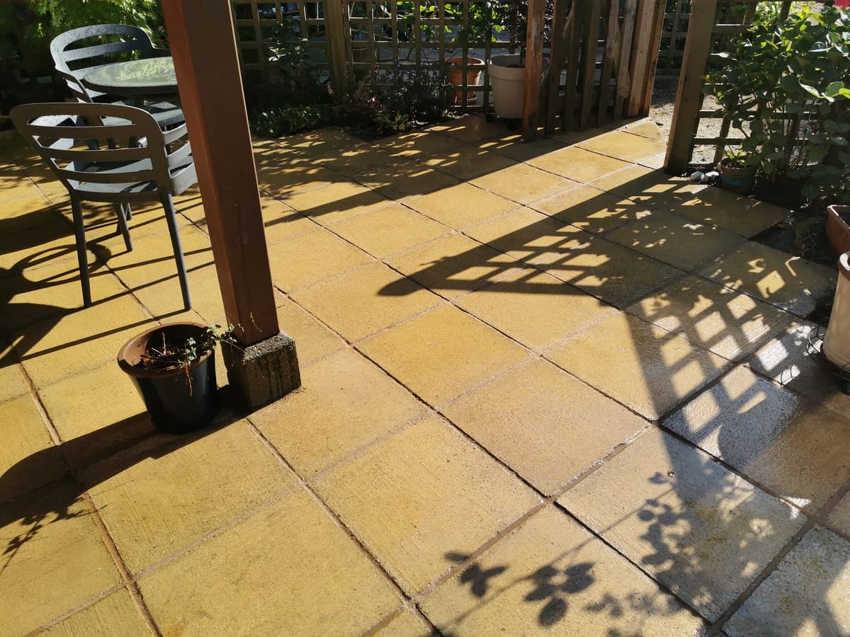After: Grey slab patio, cleaned