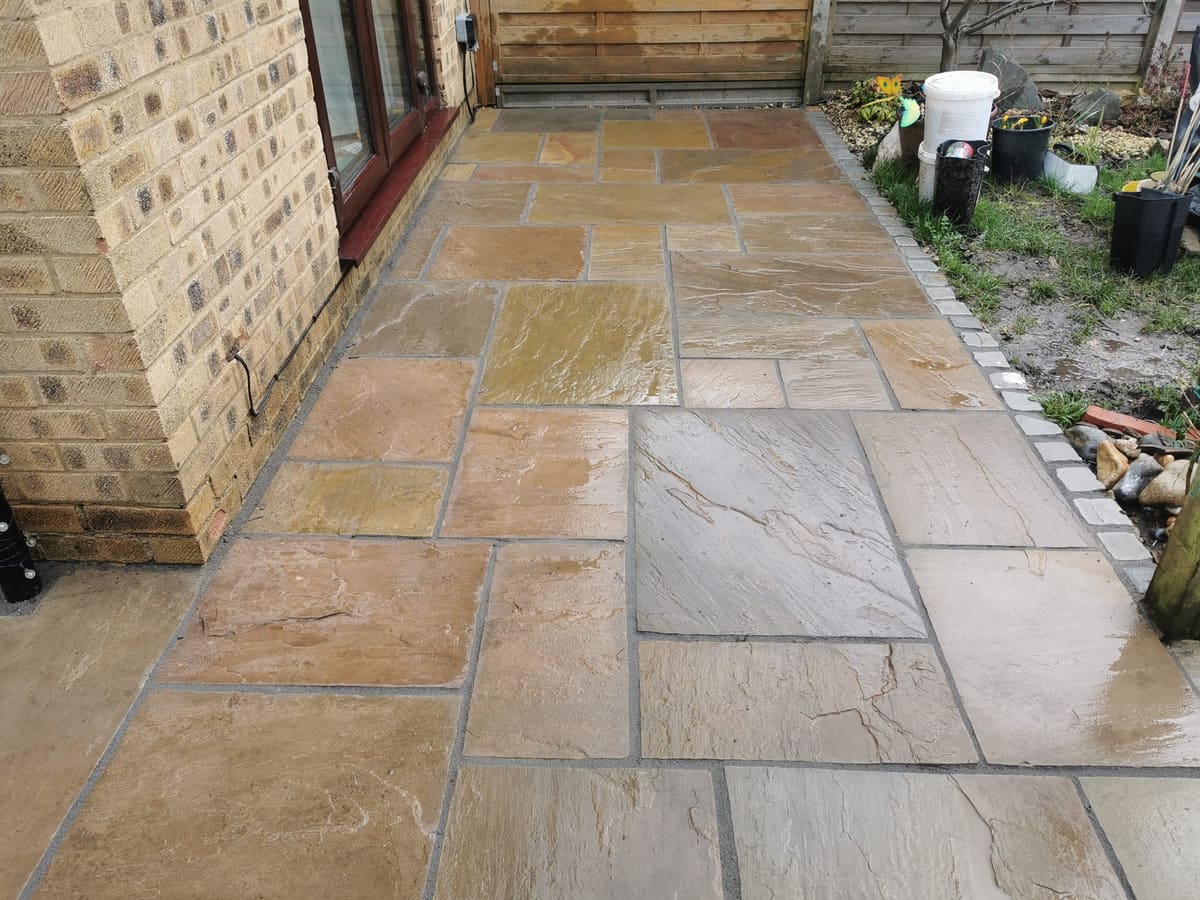 After: Stained patio, cleaned and refurbished