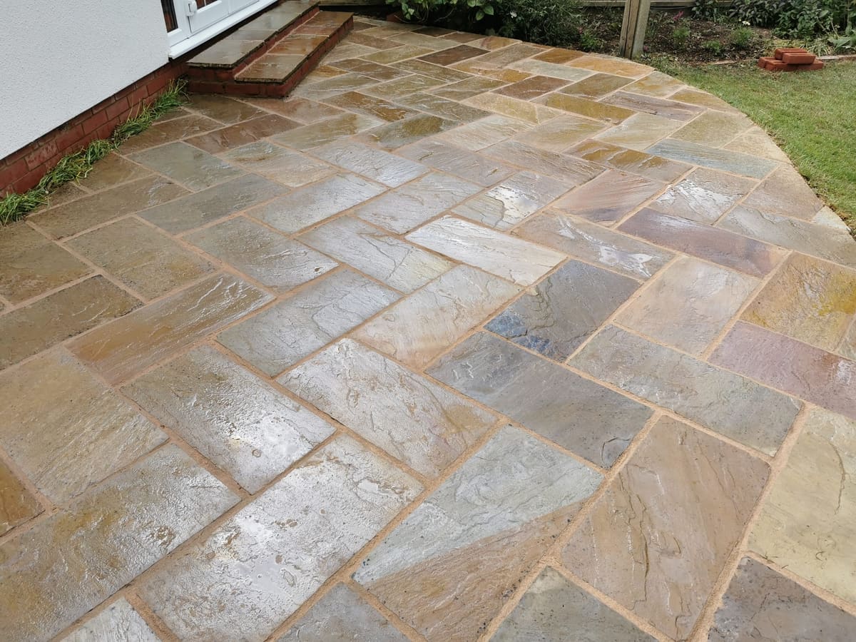 After: Weathered patio, cleaned and refurbished