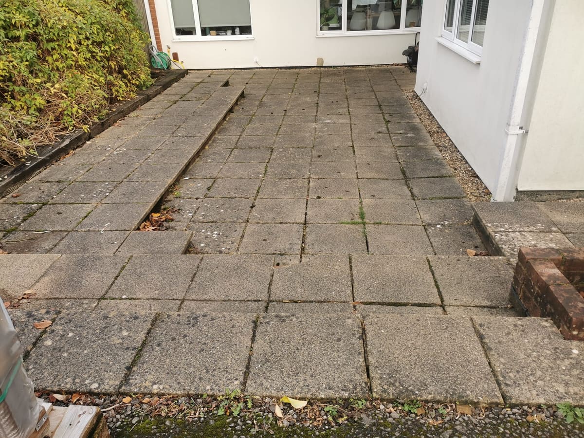 Before: Cracked concrete slabs to a new slate patio